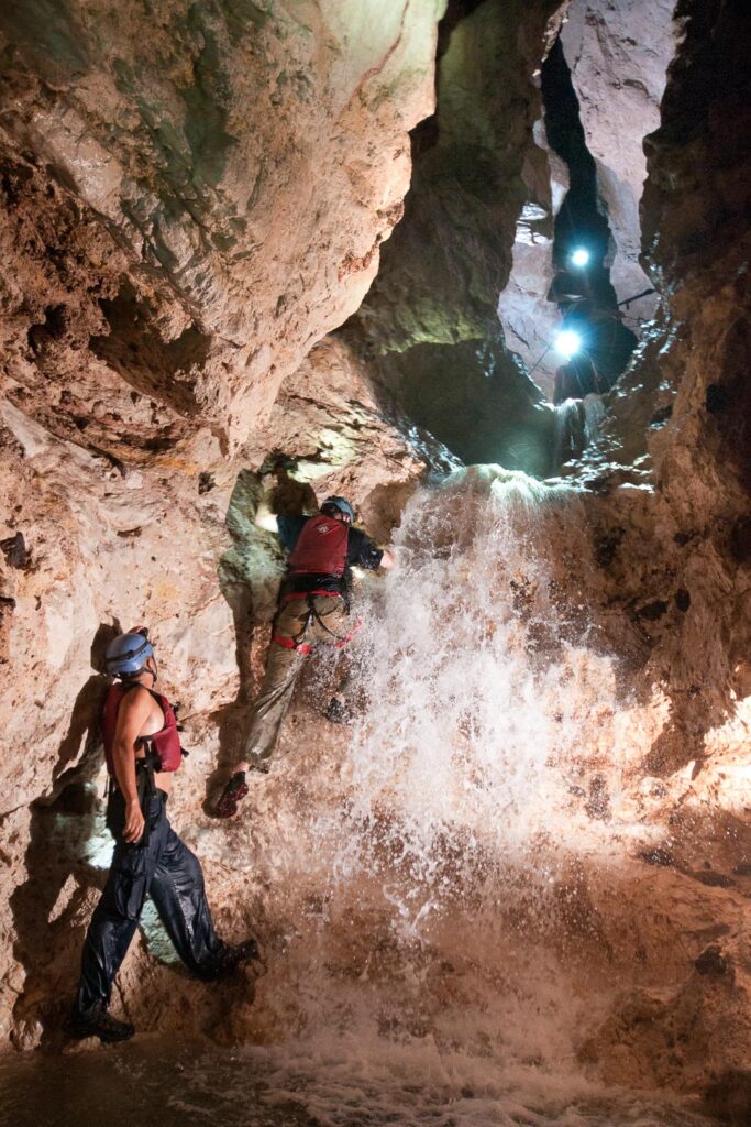 Exploring the Waterfall cave at Caves Branch, Belize