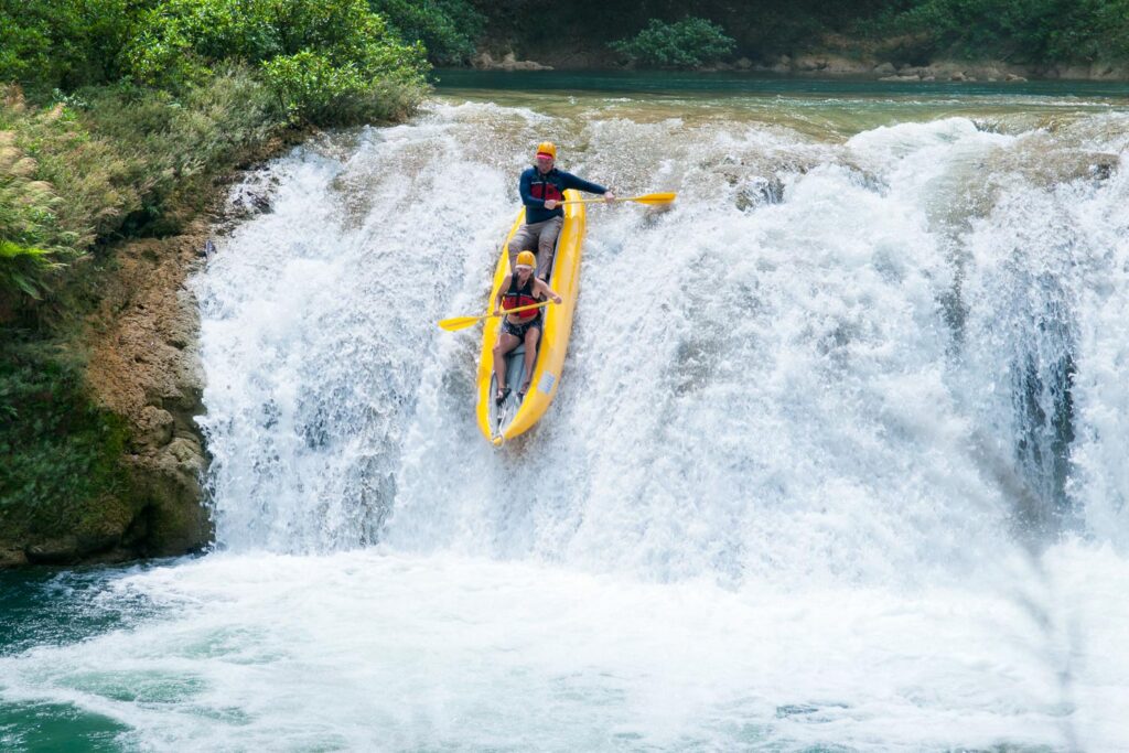 Kayaking down the drop pools of the Moho River, Belize
