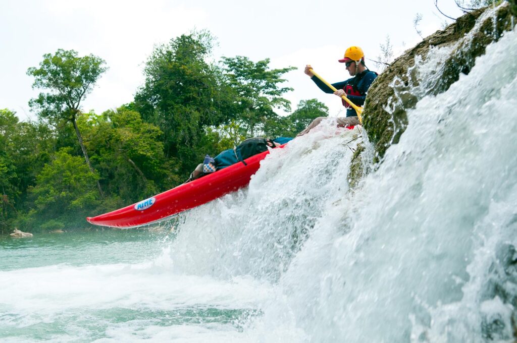 Kayaking down the drop pools of the Moho River, Belize